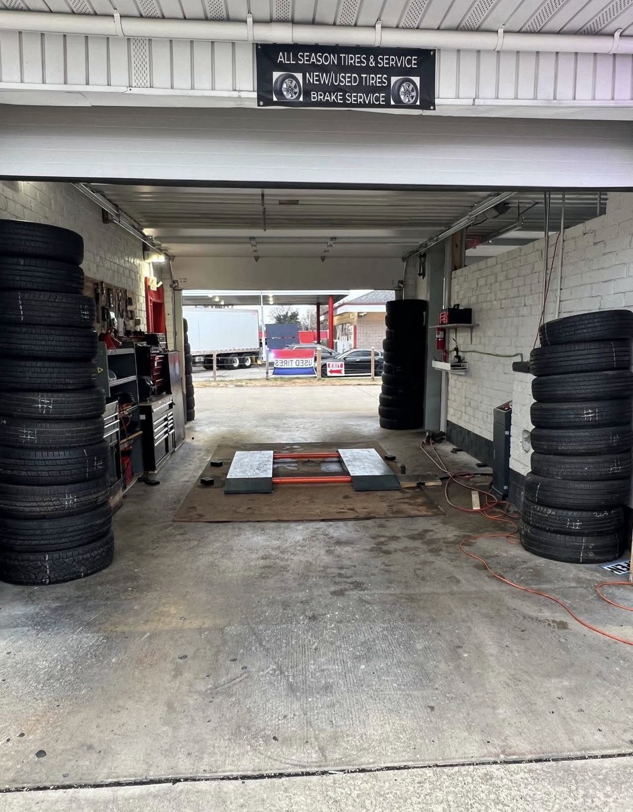 Service bay with lift and tool stations